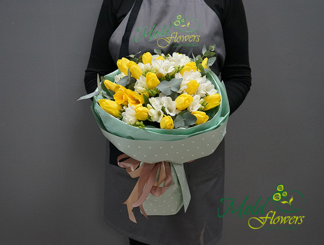 Bouquet of yellow tulips and white freesias photo